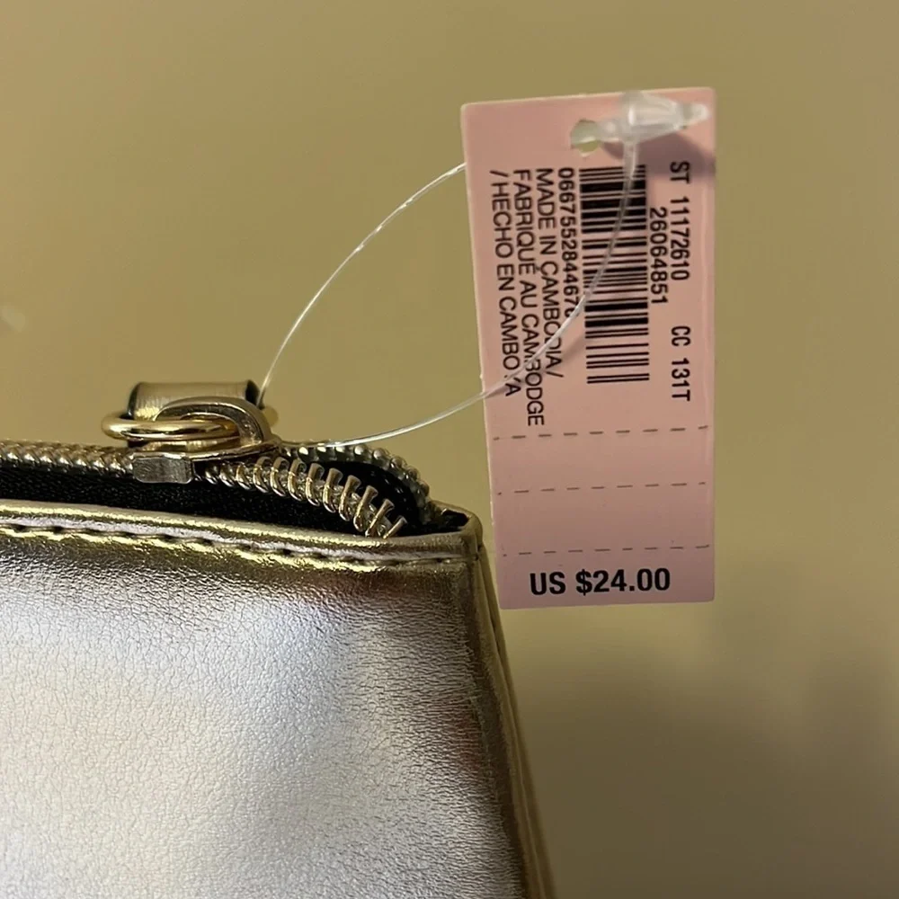 Gold Victoria’s Secret cosmetics/ small carrying bag with handle, studded heart